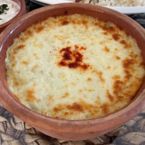 Potato tray with chicken and mozzarella cheese صينيه بطاطس بالدجاج وجبن الموزريلا